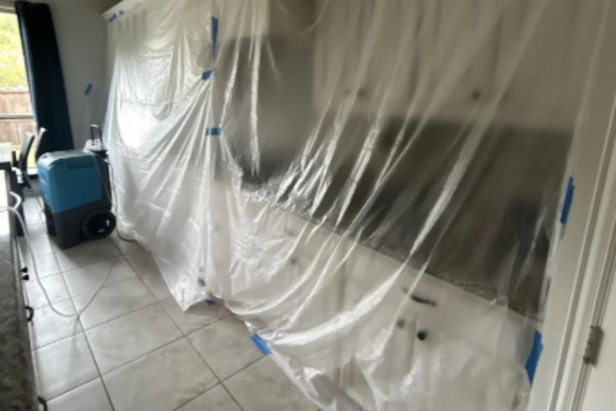 Professional water damage containment setup