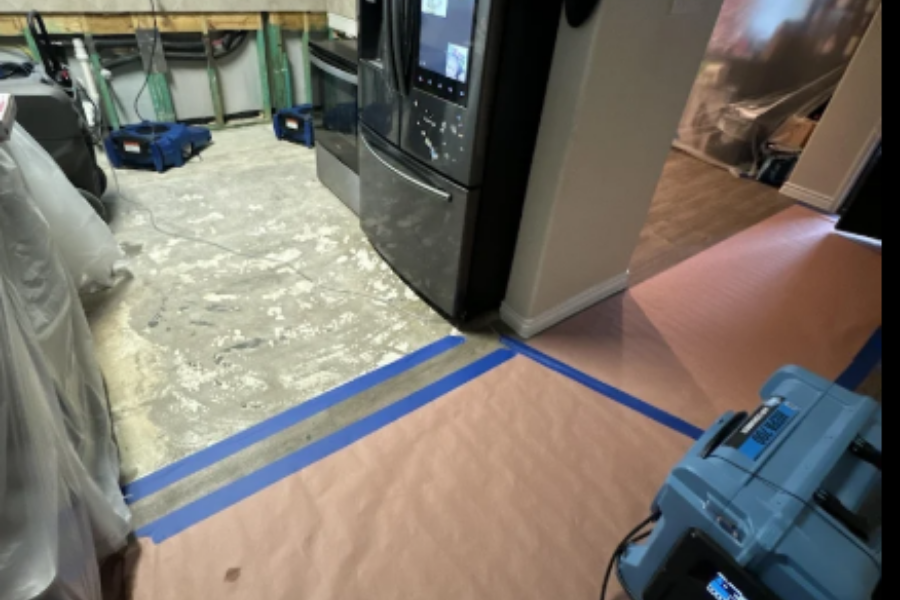 Professional drying equipment set up after dishwasher leak