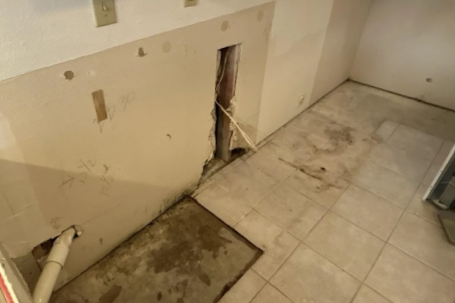 Structural water damage in bathroom