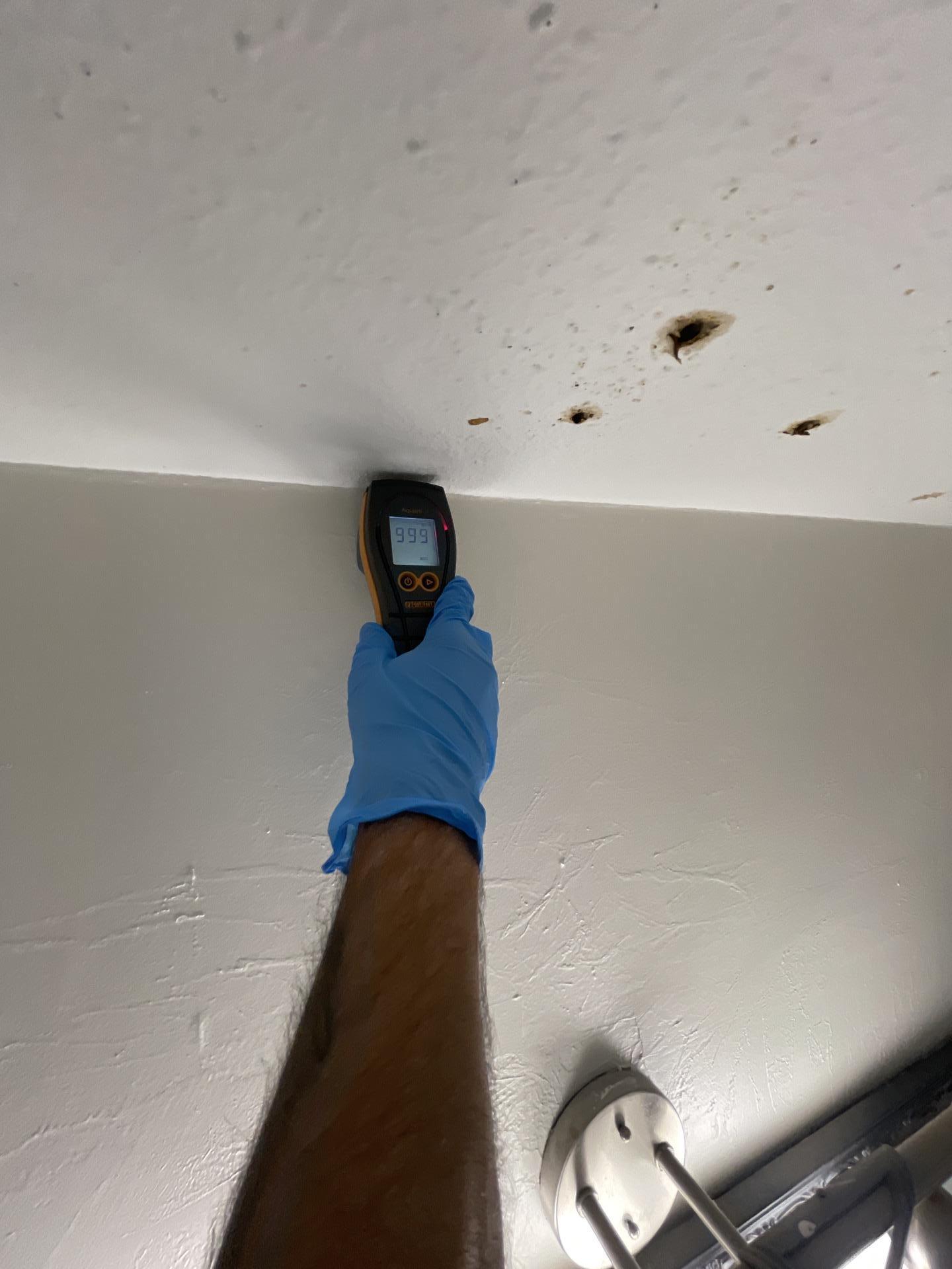 Widespread ceiling damage in bathroom