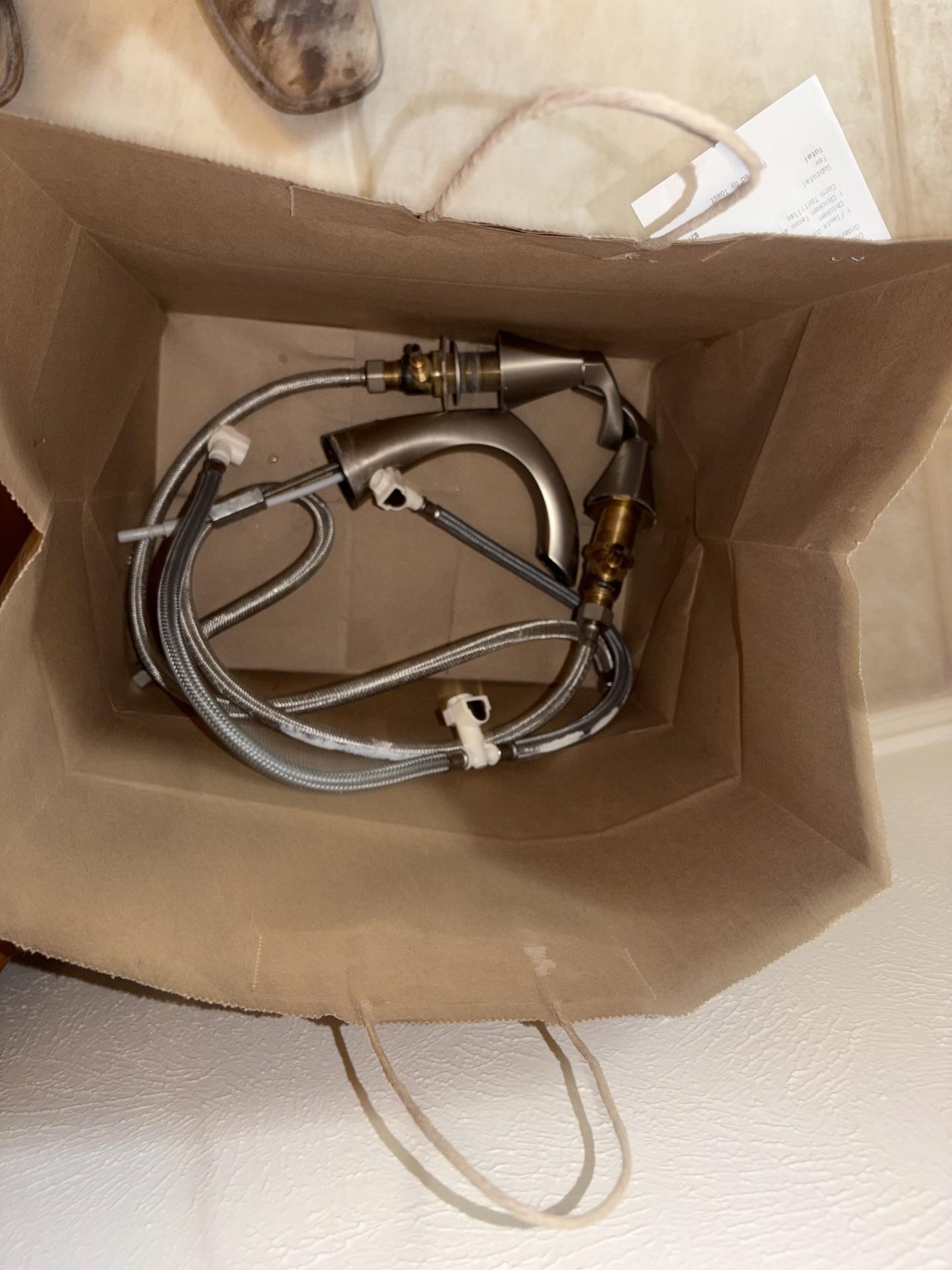 Removed faucet and plumbing fixtures