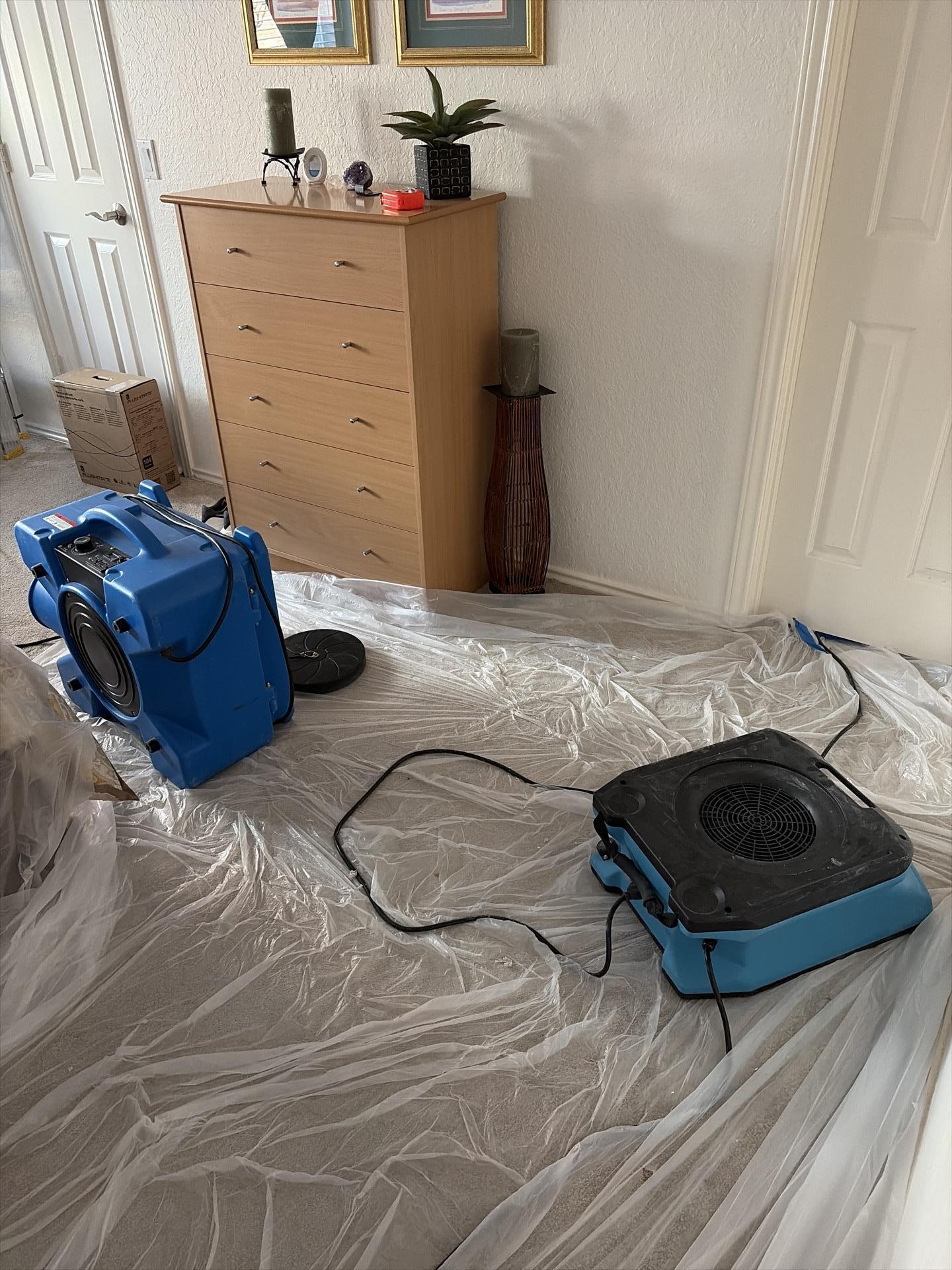 Air movers positioned in master bedroom