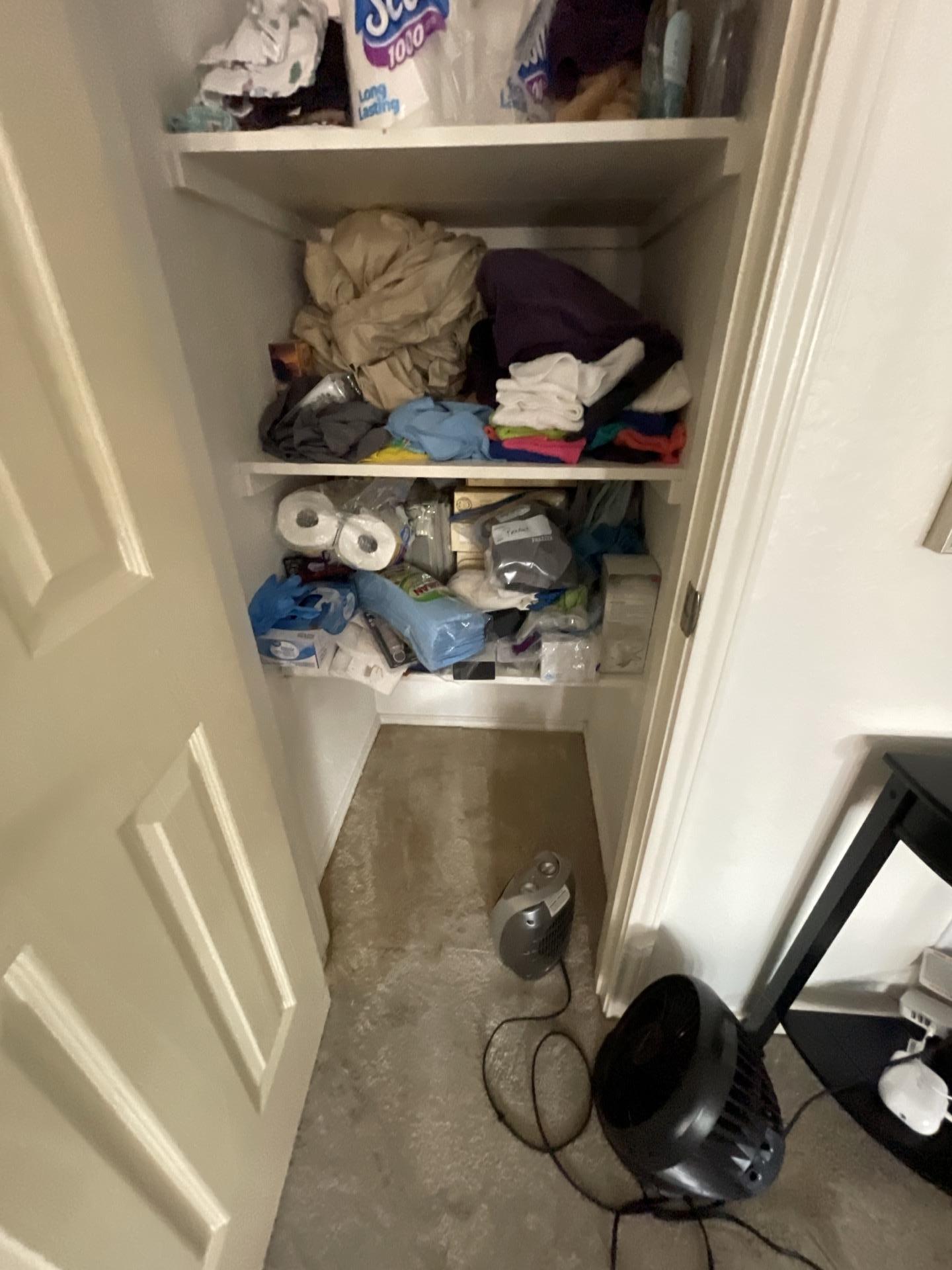 Water damage inside bedroom closet
