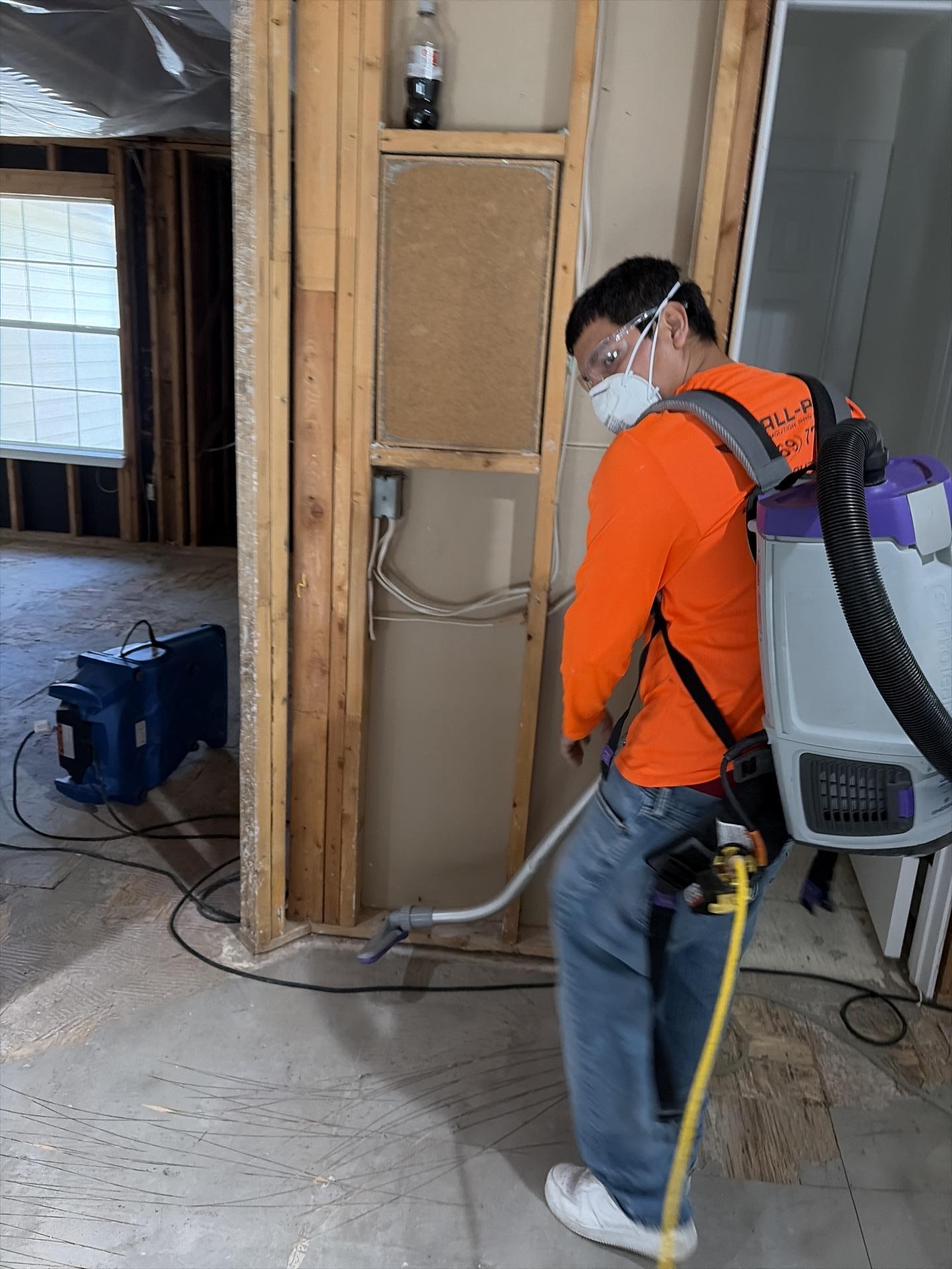HEPA vacuuming in upstairs hallway