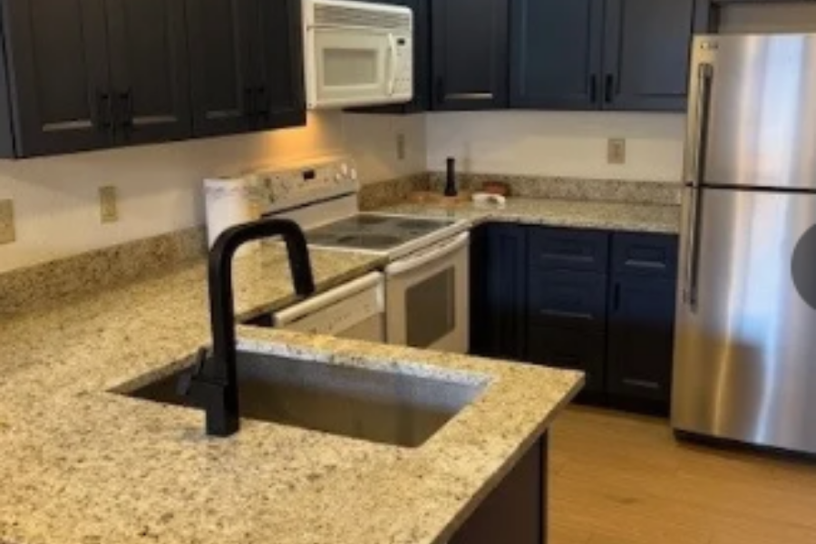 Fully restored kitchen showing completed reconstruction work