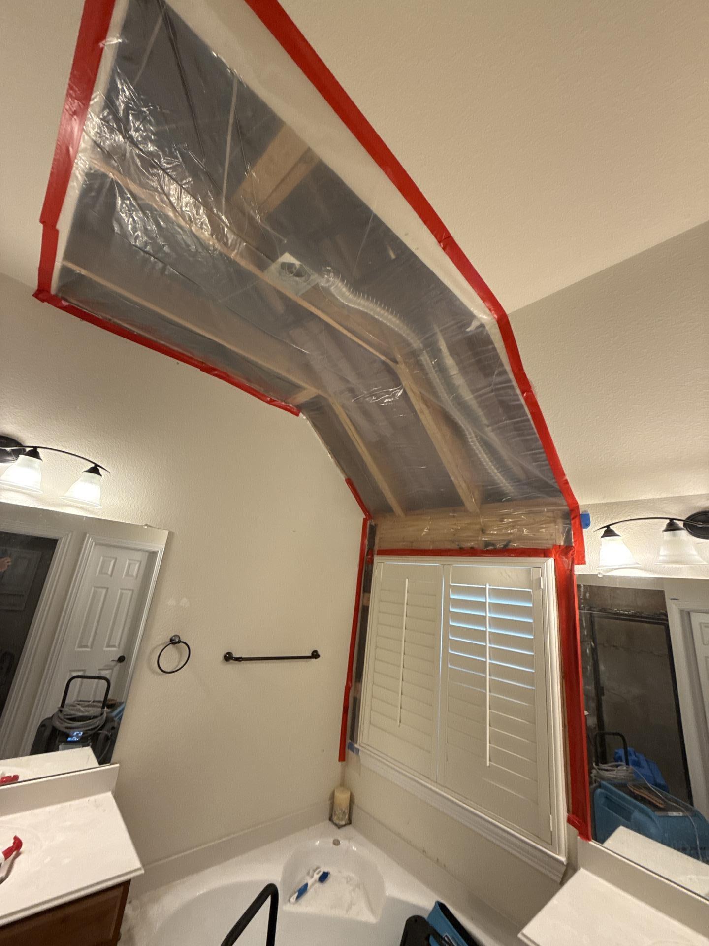 Master bathroom ceiling during cleanup process