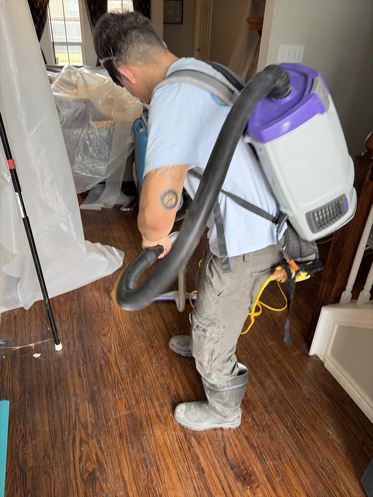 HEPA vacuuming being performed after water damage demo to remove debris and contaminants