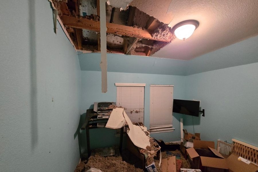 Ceiling water damage from storm-related pipe failure in a North Texas home