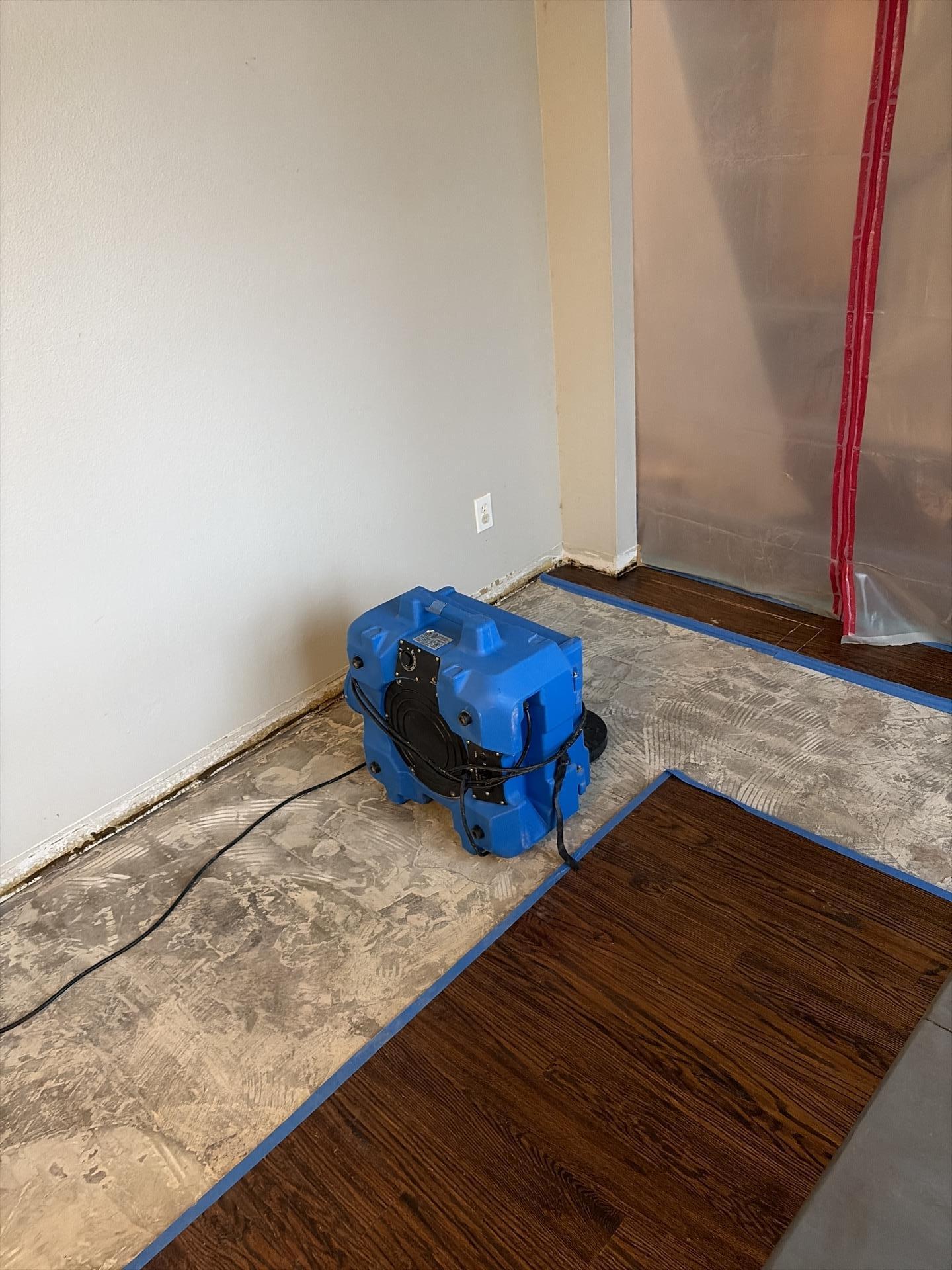Drying equipment and containment set up in play room during water damage restoration