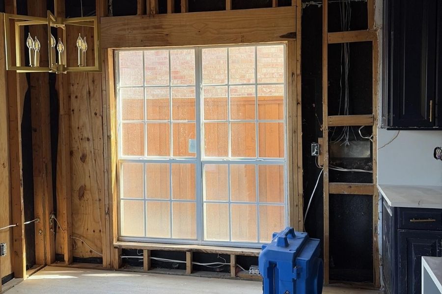 Water damage restoration in progress inside a DFW home