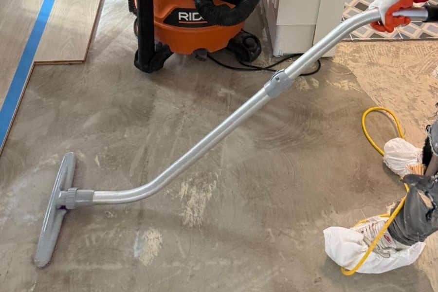Professional water extraction equipment removing standing water during emergency restoration in DFW