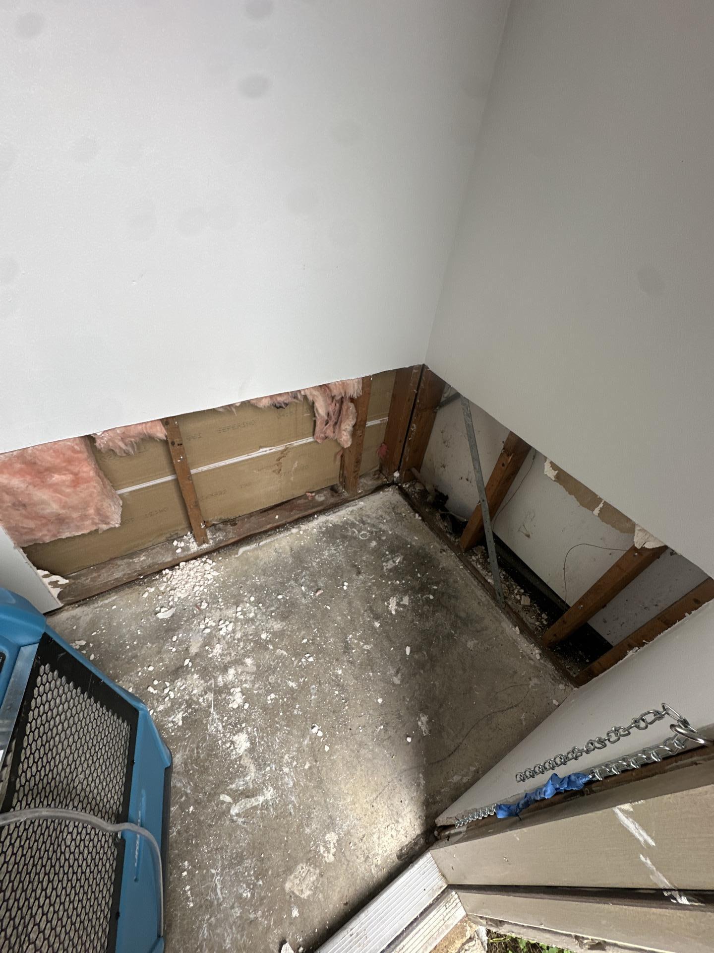 Flood cuts made in the outside closet drywall to reach wet framing