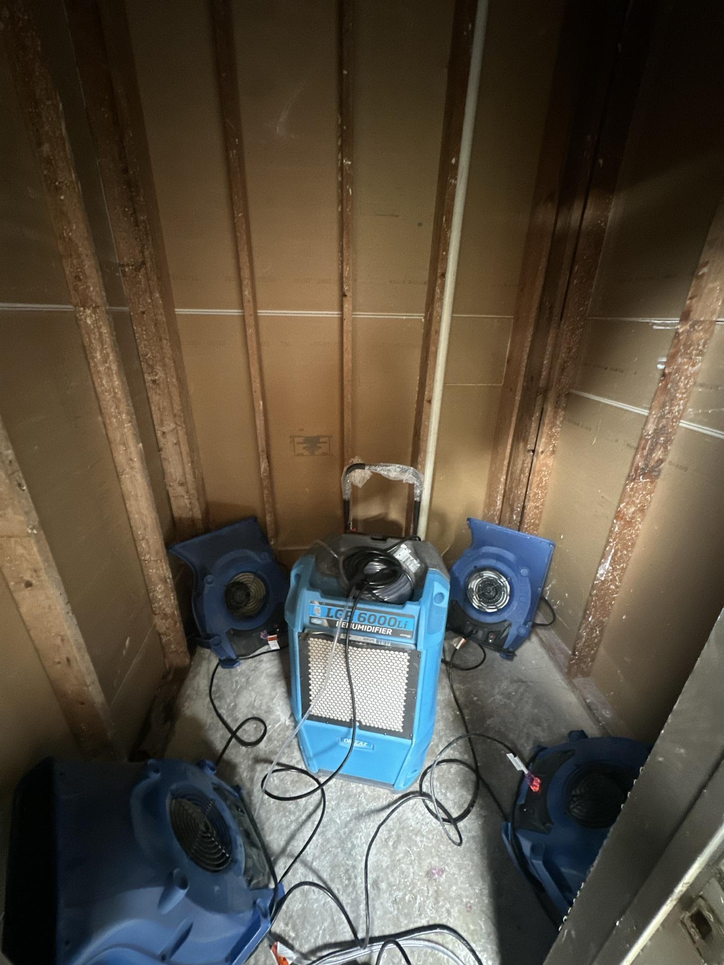 Second outside closet during combined demo and drying