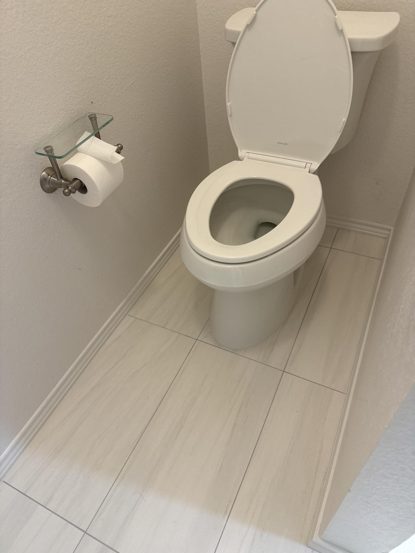 Finished master bathroom vanity and flooring after reconstruction