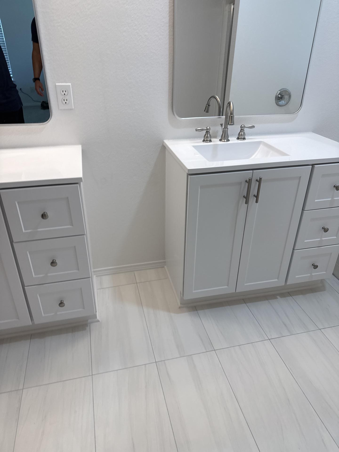 Master bathroom restored after reconstruction following the water damage