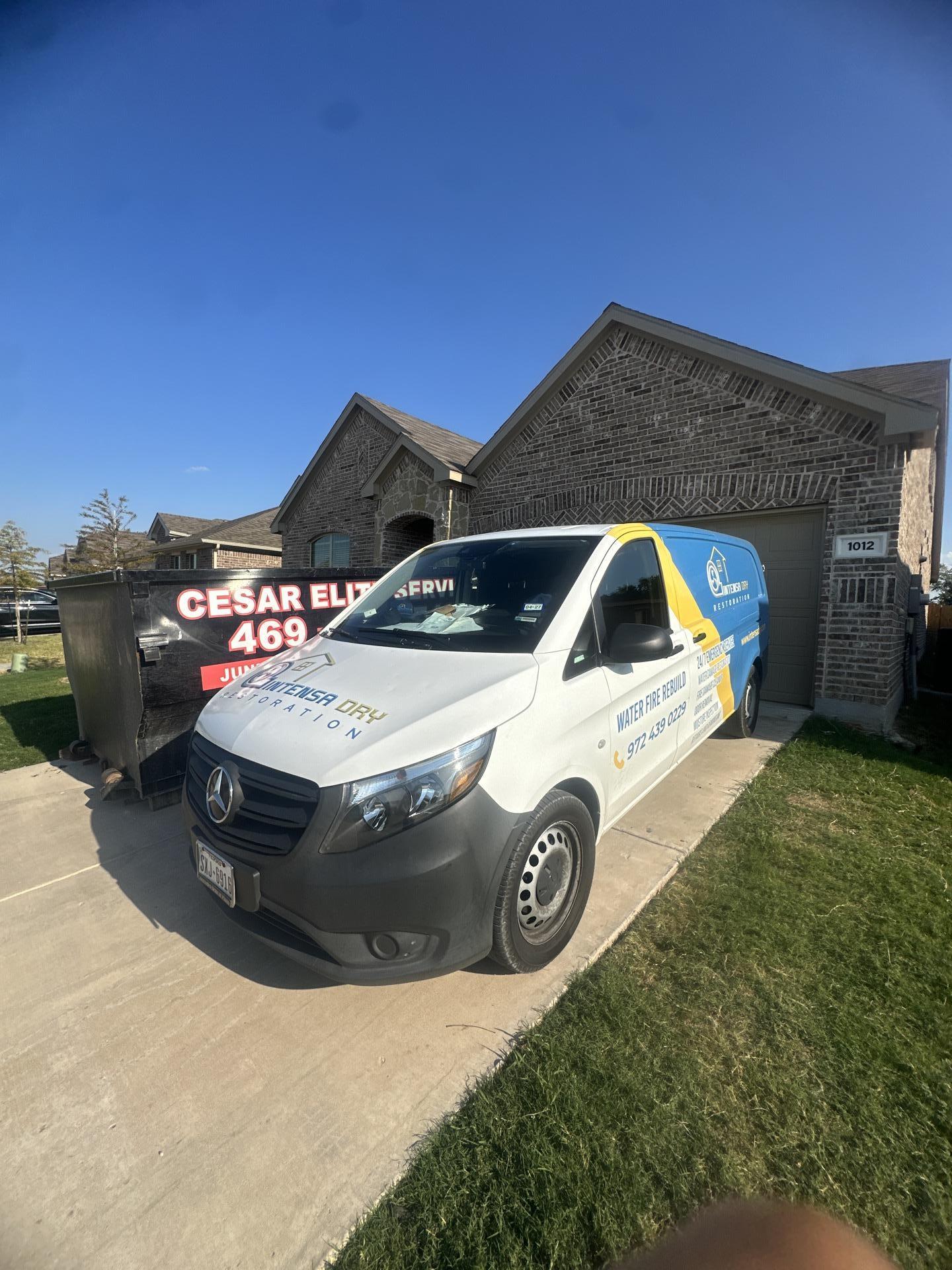 Intensa Dry Mold and Water Restoration truck parked in front of the affected Princeton home