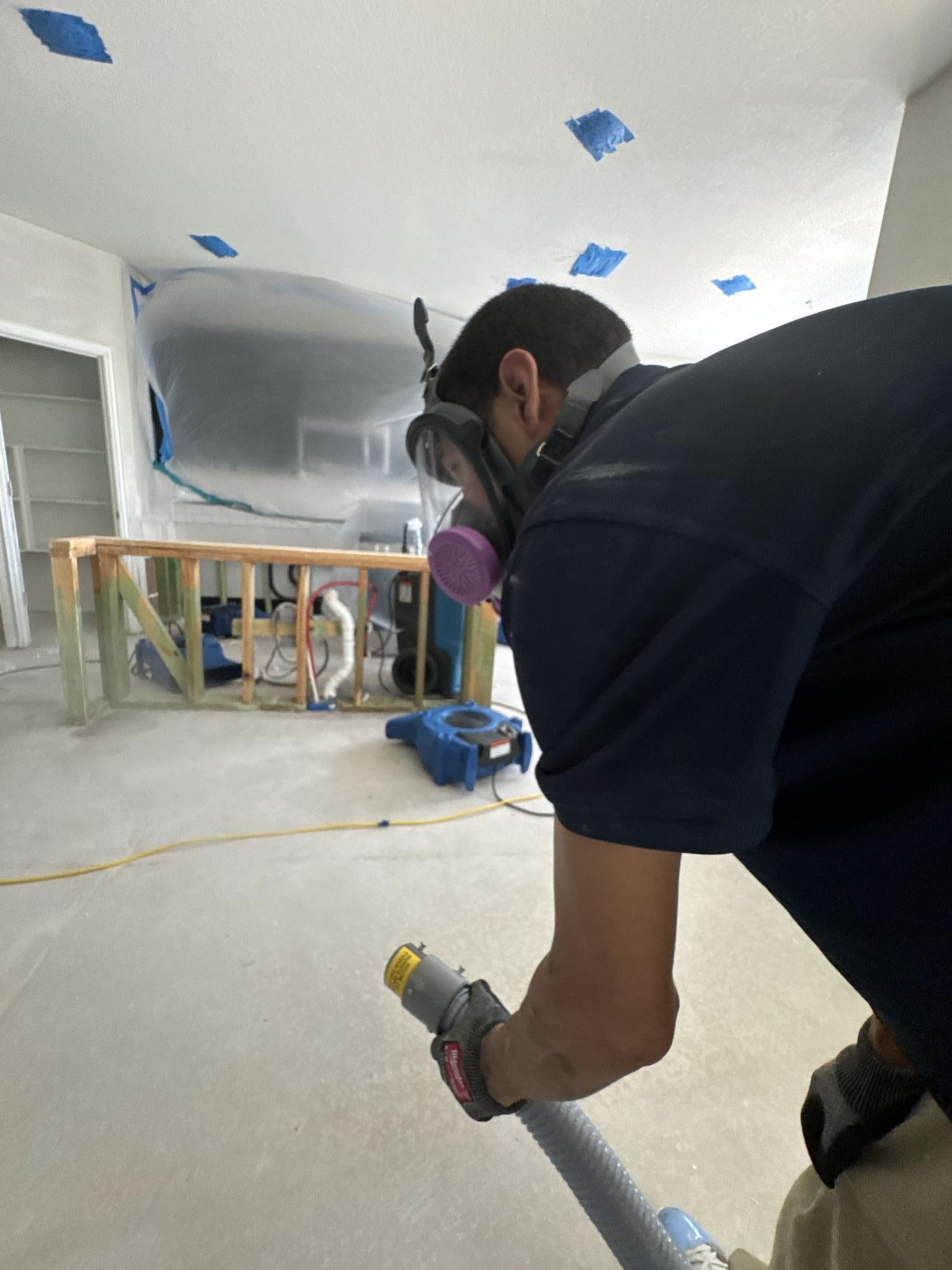 Demo, HEPA vacuuming, containment and air scrubbing in the kitchen and living room